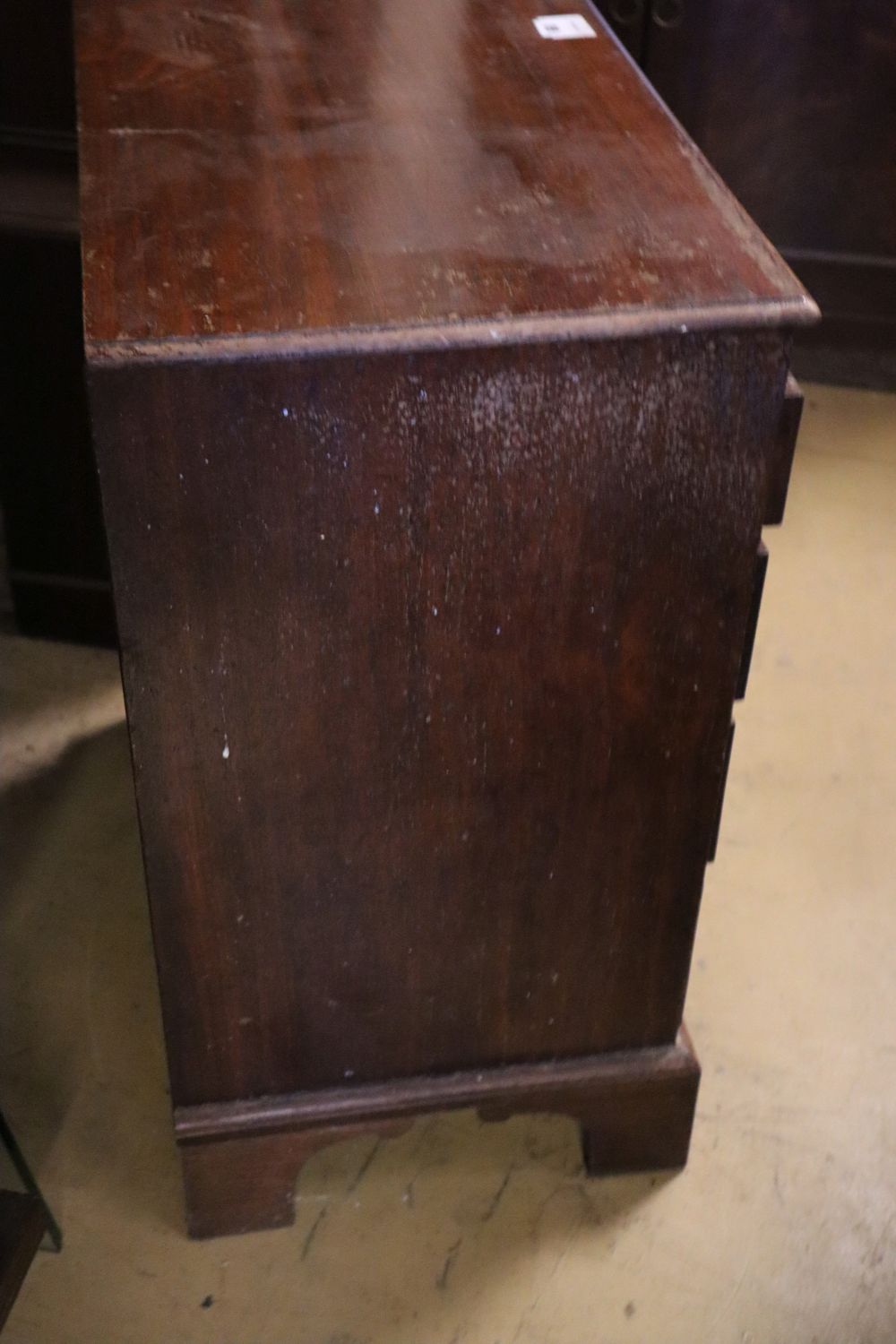 A small mahogany chest fitted brushing slide and four long drawers, width 62cm